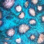 Blue and pink textured abstract pattern.